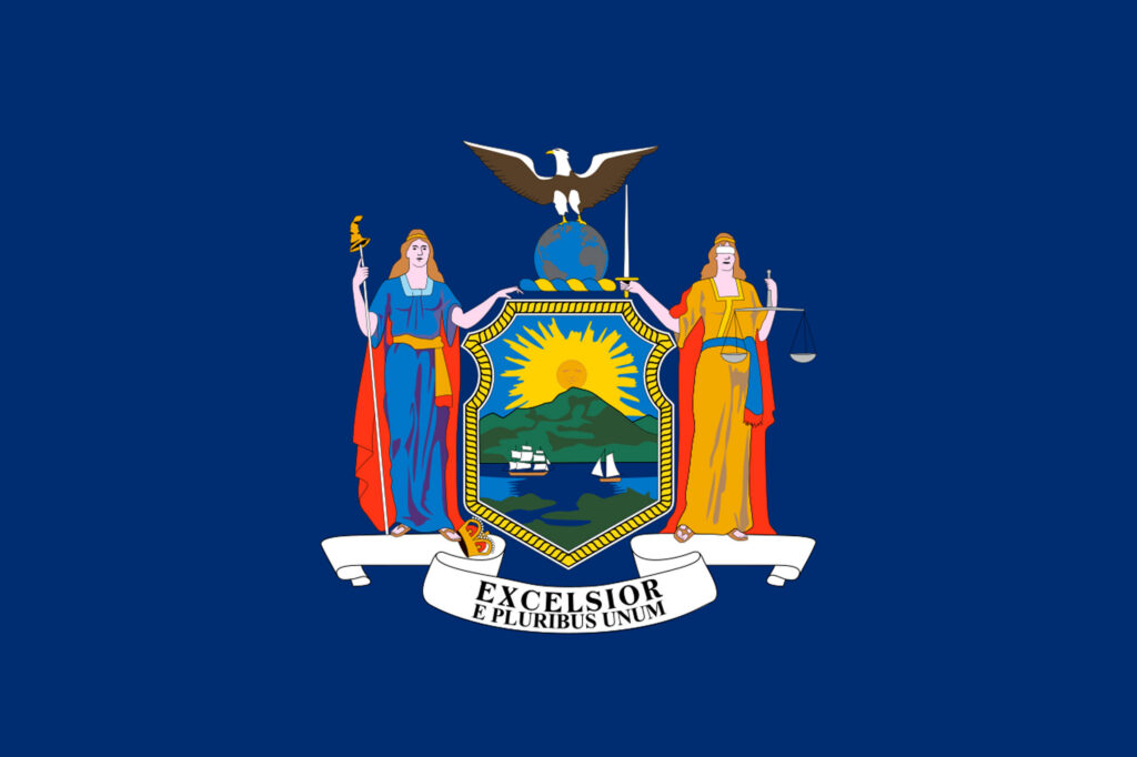 Flag of New York State: navy background with the state coat of arms, featuring a sunrise over mountains, the goddesses Liberty and Justice, and the motto 'Excelsior.'